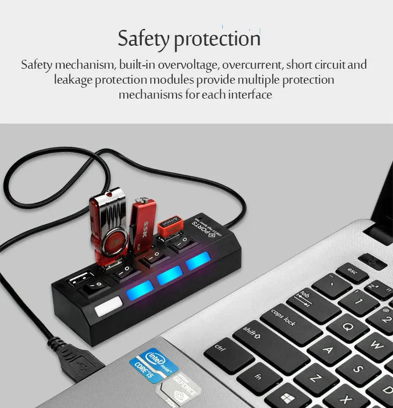 A black 7-port USB hub with individual power switches and blue LED indicators connected to a laptop.