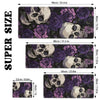 A set of three desk mats featuring a gothic design of skulls and purple roses.