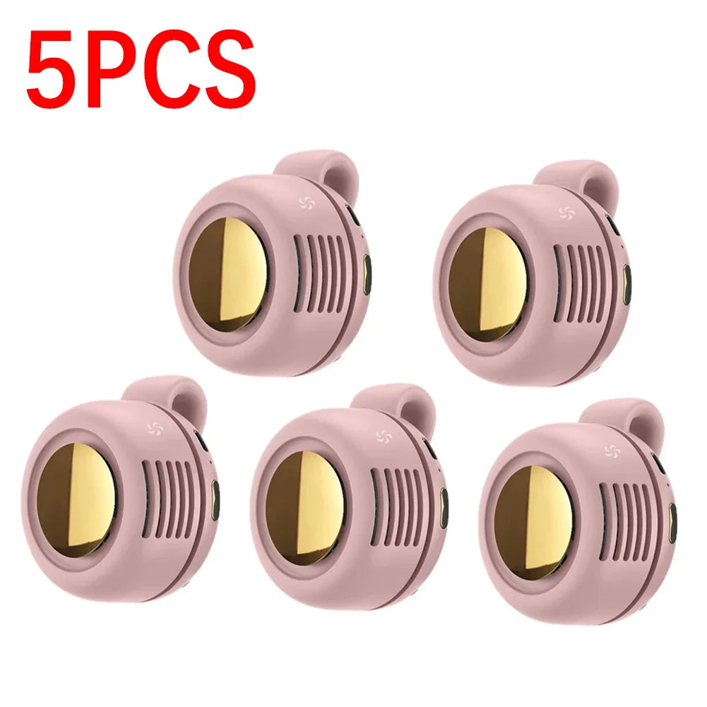 Five pink portable mini blade-less electric fans shown in various angles