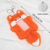 Orange fox plush keychain with a soft cover and chain