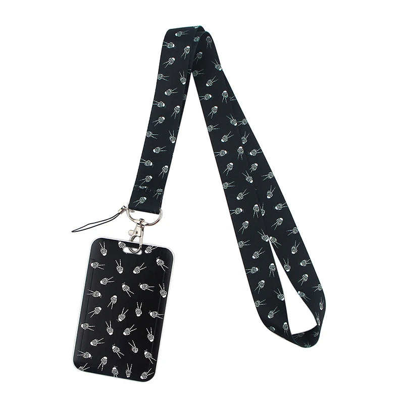 Black minimalist key lanyard featuring a repeating pattern of small, stylized pineapples.