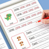 A page from a learning workbook showing tracing practice for numbers and letters with illustrations of a dinosaur and dogs.