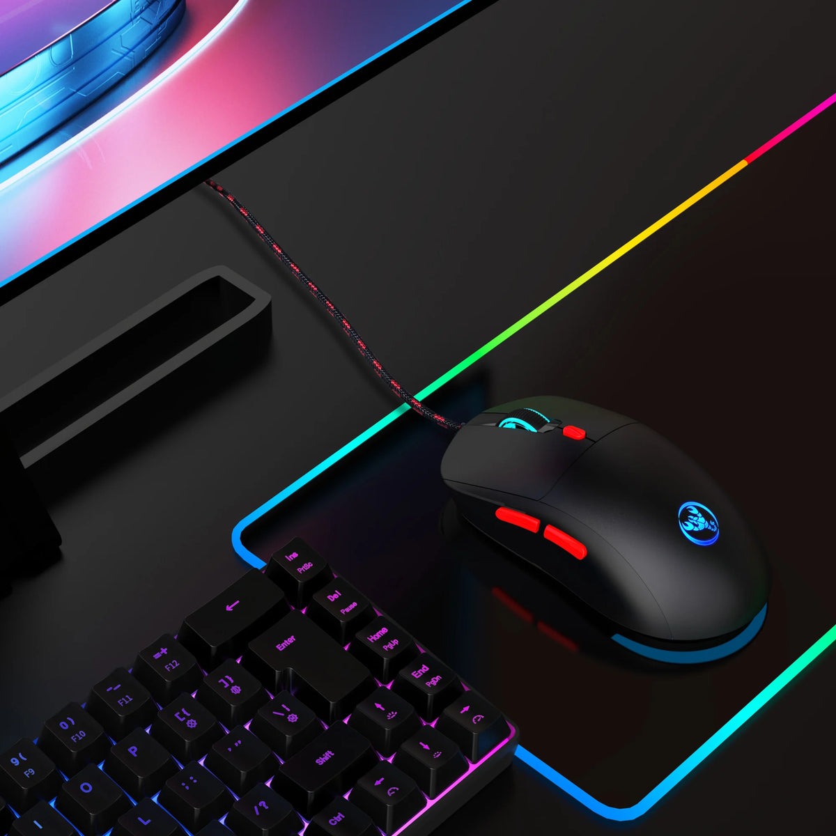 A black 6-key wired gaming mouse with RGB backlight is shown next to a keyboard on a dark surface.