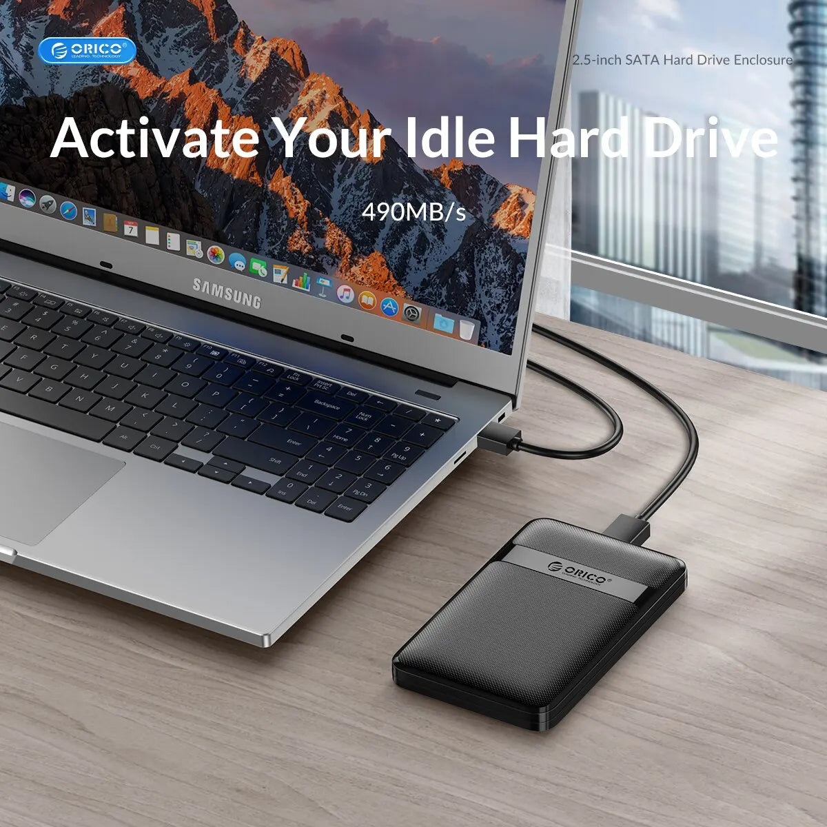 A silver laptop is shown with a hard drive enclosure plugged into a USB cable, demonstrating the activation of an idle hard d