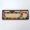 A close-up view of a brown PBT keycap set for a mechanical keyboard featuring various colored and themed keys.