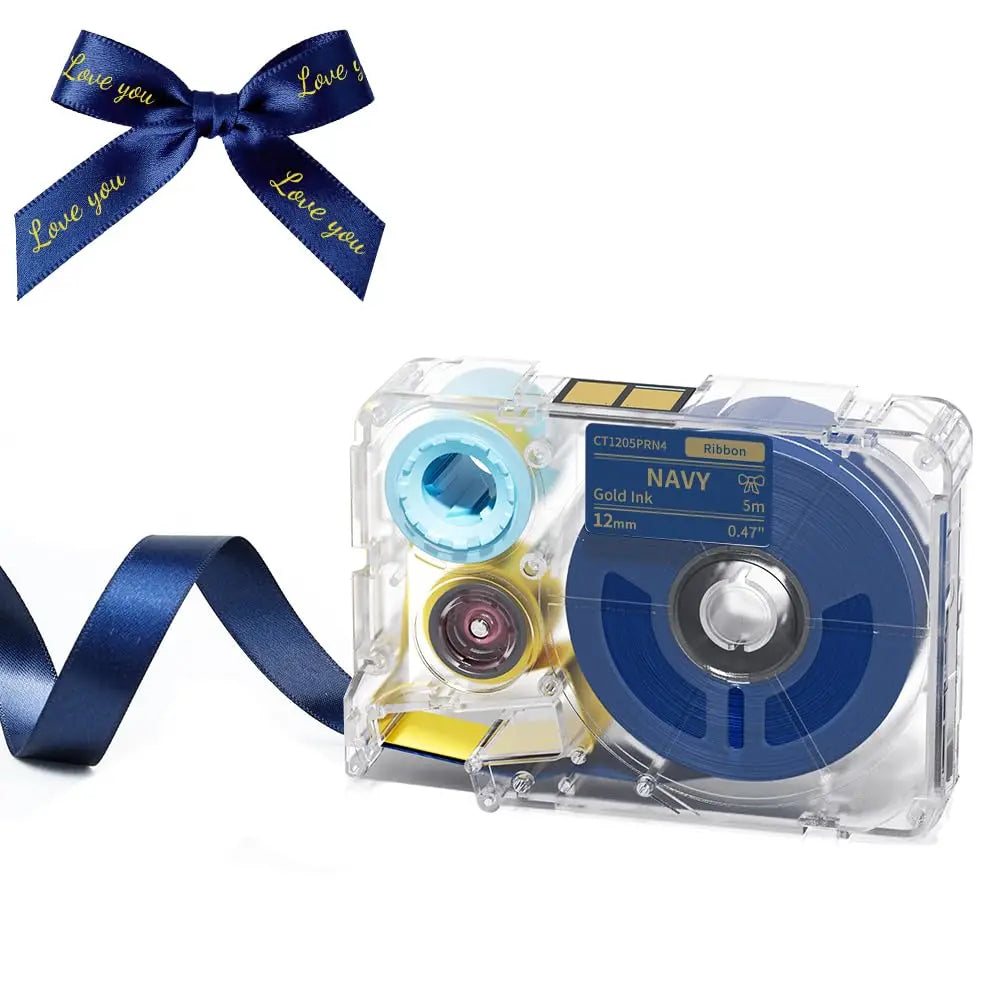 A clear plastic label maker device with a navy ribbon and gold ink ribbon is shown next to a bow.