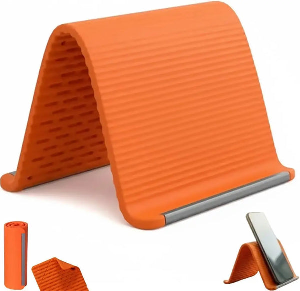 An orange flexible silicone phone stand shown in a profile view with an attached strap.