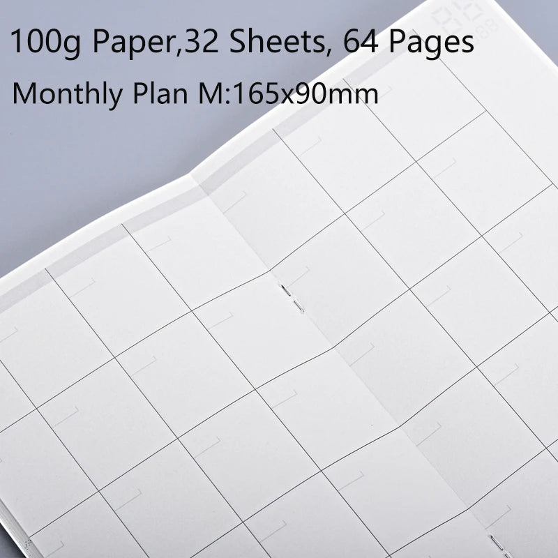 A page from a monthly planner or journal featuring grid lines and ruled sections.