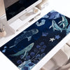 A dark blue and purple whale shark themed mouse pad with an anti-slip rubber base