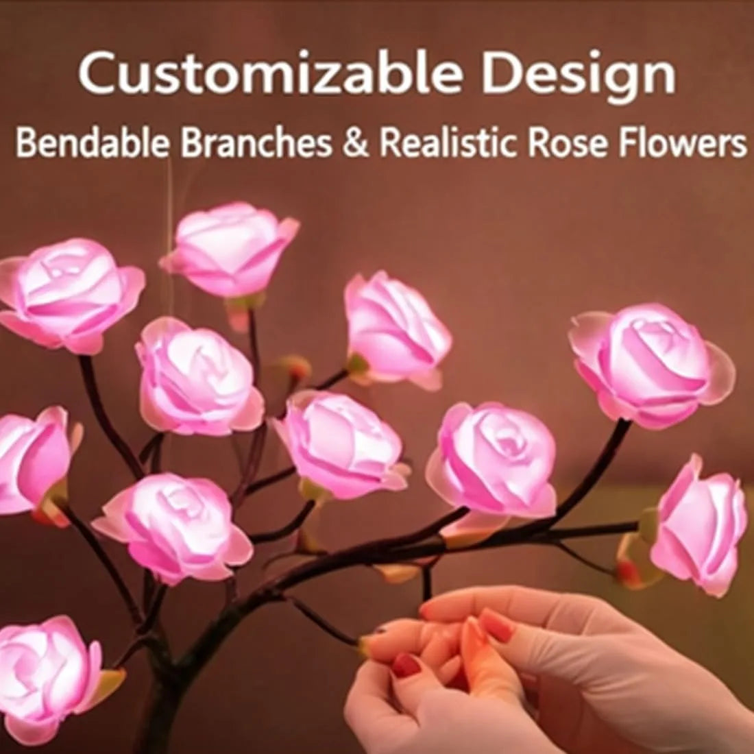 Hands are adjusting bendable branches and realistic rose flowers on a dark tree light.