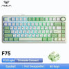 A white mechanical keyboard featuring RGB lighting, gasket mount design, and hot-swappable switches.