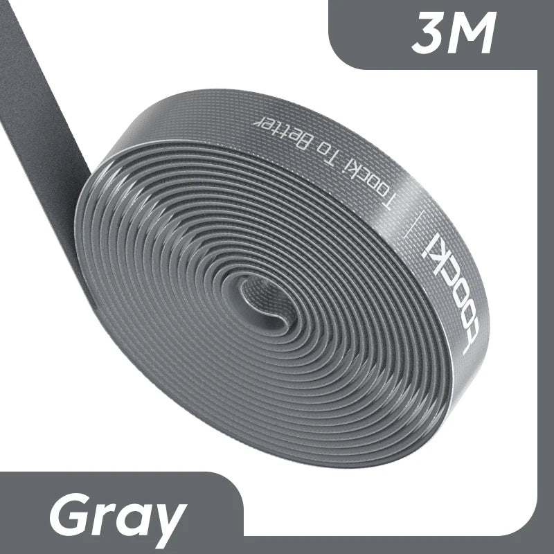 Graues 3M-Klebeband-Spulenkabel mit dem Text 'Tool Kit to Better' sichtbar.