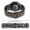 A black watch with a leopard print silicone sports band is shown on a white background.