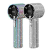 A silver and iridescent portable handheld cooling fan with a black grille and textured finish.