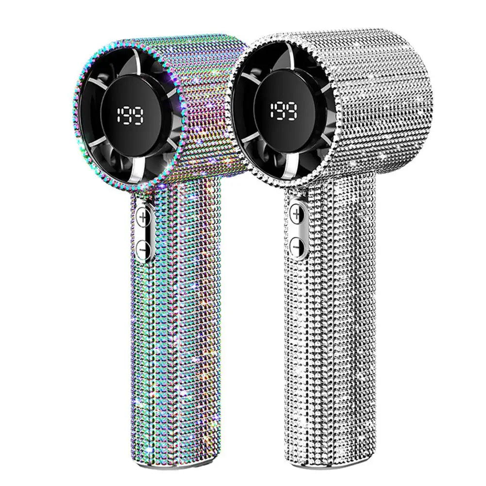A silver and iridescent portable handheld cooling fan with a black grille and textured finish.