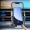 A silver wireless car phone mount holding an iPhone, demonstrating a second speed take and release feature.