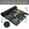 A dark floral design mouse pad with a non-slip rubber base, showing features like breathability and anti-abrasion.