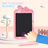 A pink LCD drawing tablet is being held by a hand, demonstrating its use for creative activity.