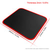 Black gaming mouse pad with a red stitched edge shown from above.