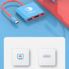 A blue multifunction adapter with HDMI and USB-C ports is shown next to a projection screen.