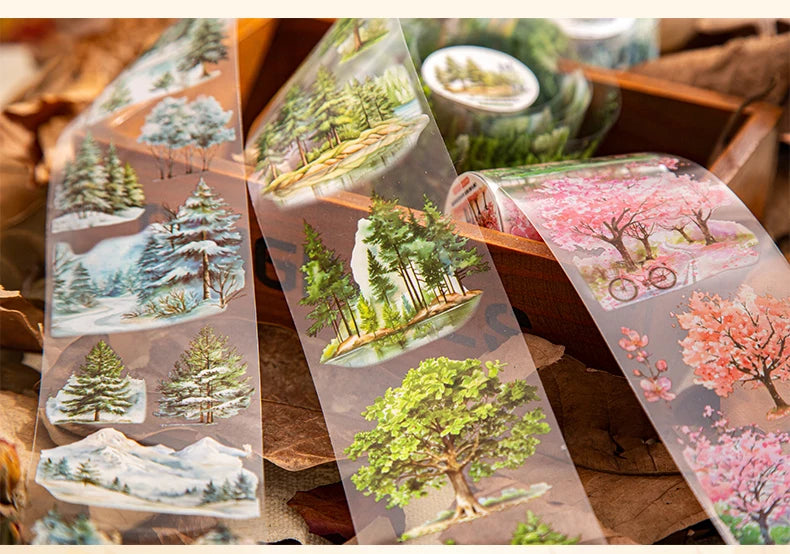 Clear botanical PET tape featuring watercolor forest scenes of trees and nature for journaling and crafts