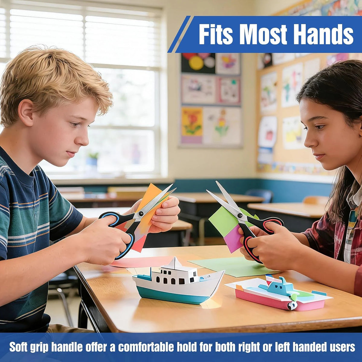 Two students use a multipurpose stainless steel scissors set to cut paper for an activity.