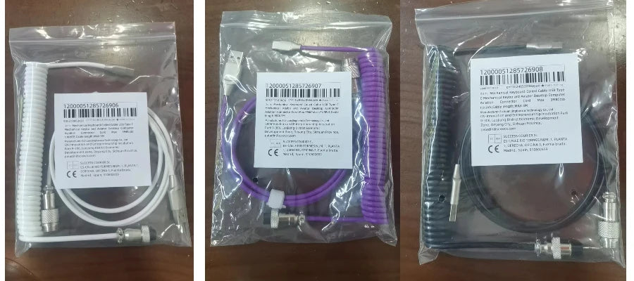 A package containing a purple coiled USB-C cable and various connectors for mechanical keyboards.