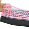 A hand is holding a clear silicone keyboard cover for a Logitech MK345 keyboard.