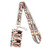 A colorful patterned lanyard with a clip attached, featuring illustrations of various food items.