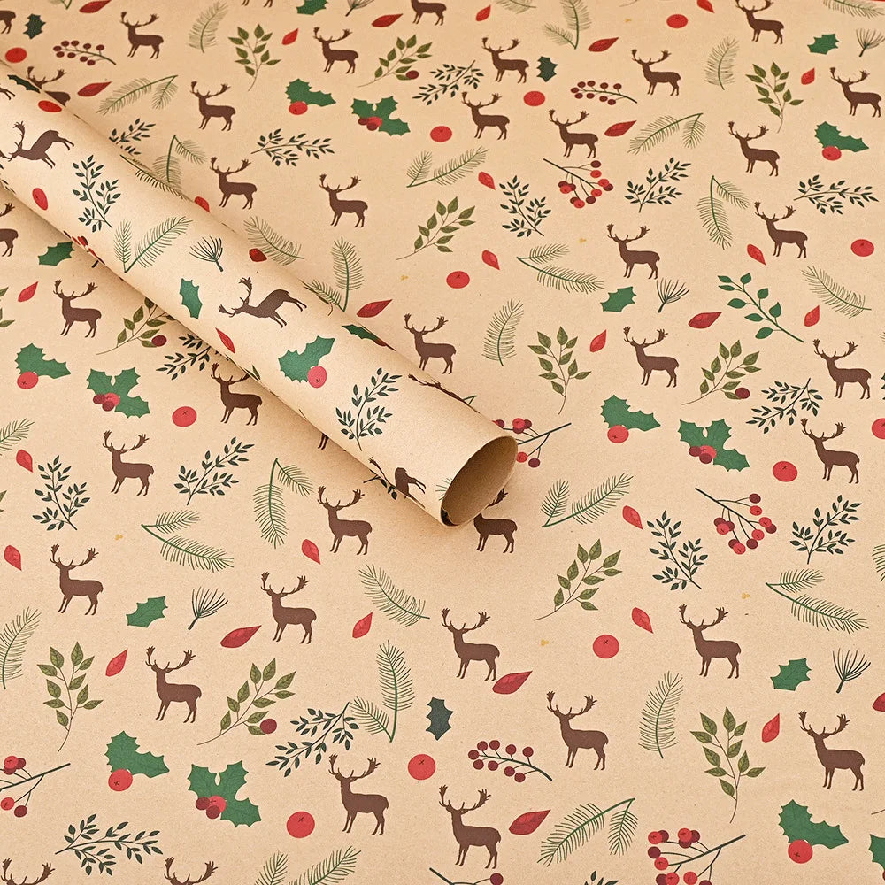 Roll of kraft wrapping paper featuring deer and evergreen designs for Christmas.