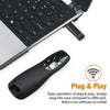 A black wireless presentation pen and remote control are shown next to a laptop keyboard.