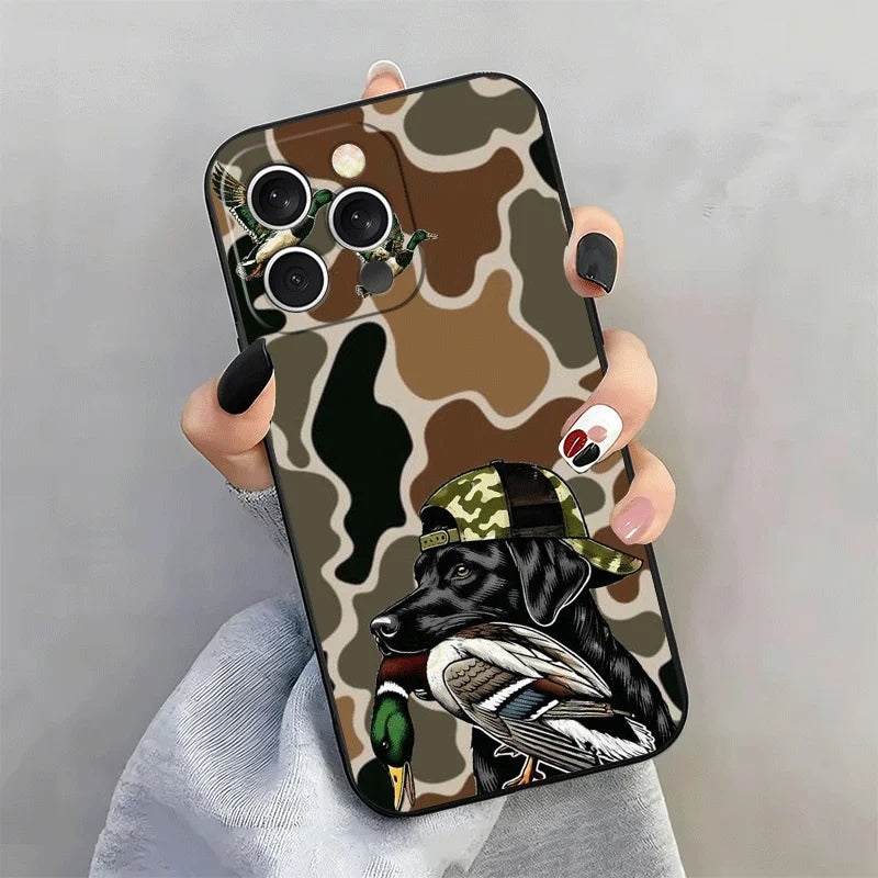 A phone case featuring a camouflage pattern with eyes and a hunting dog design.