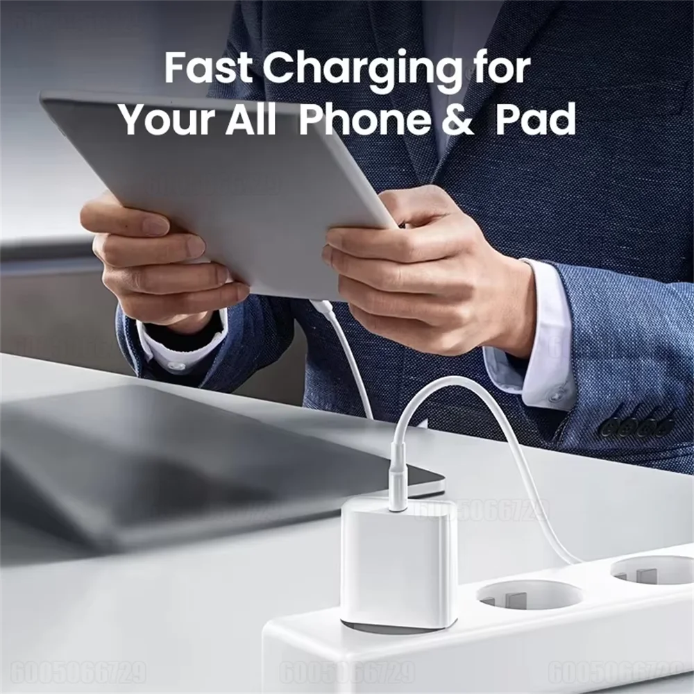 Hands hold a tablet while a white fast charging cable connects to a charging block.