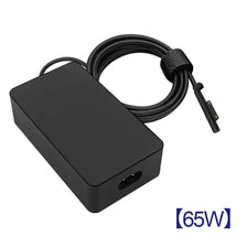 Cargador universal negro para tableta con cable enrollado y conector para dispositivos Surface