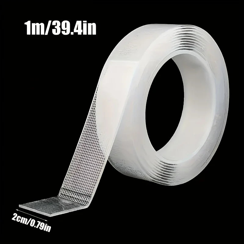 Roll of 1m/39.4in heavy duty double-sided transparent mounting tape with a 2cm/0.79in strip shown on the side