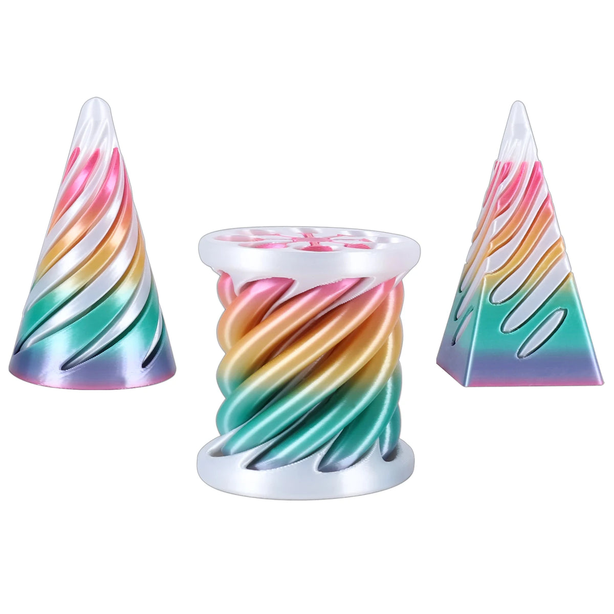 Un set de tres juguetes antiestrés en espiral de colores rosa iridiscente, verde y morado.