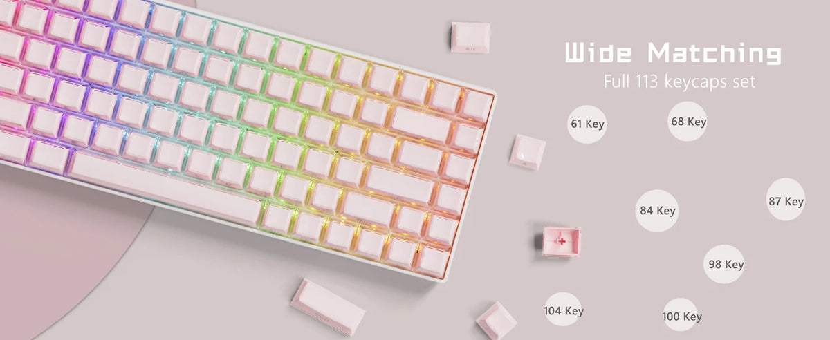 A close-up view of a mechanical keyboard with translucent ice crystal keycaps, showcasing various keycap sets.