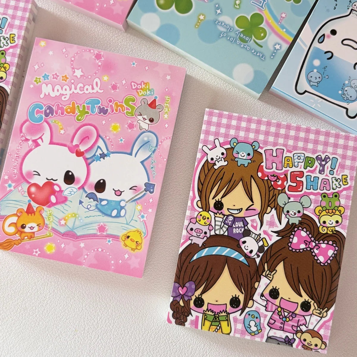 A collection of colorful magical candy twins memo pads featuring cute characters and pastel designs.
