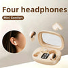Four Mini Comfort headphones and a charging case are shown on a white surface.