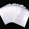 A fan of clear white self-sealing pearl film bubble shipping bags arranged in a fan shape.