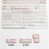 A collection of dye-sublimated PBT keycaps in various sizes and designs for mechanical keyboards.