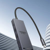 A black USB 3.2 Gen 2 10Gbps hub device is shown against a modern, light gray background.