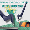 A dark purple cutting craft tool is shown next to a ruler on a green cutting mat.