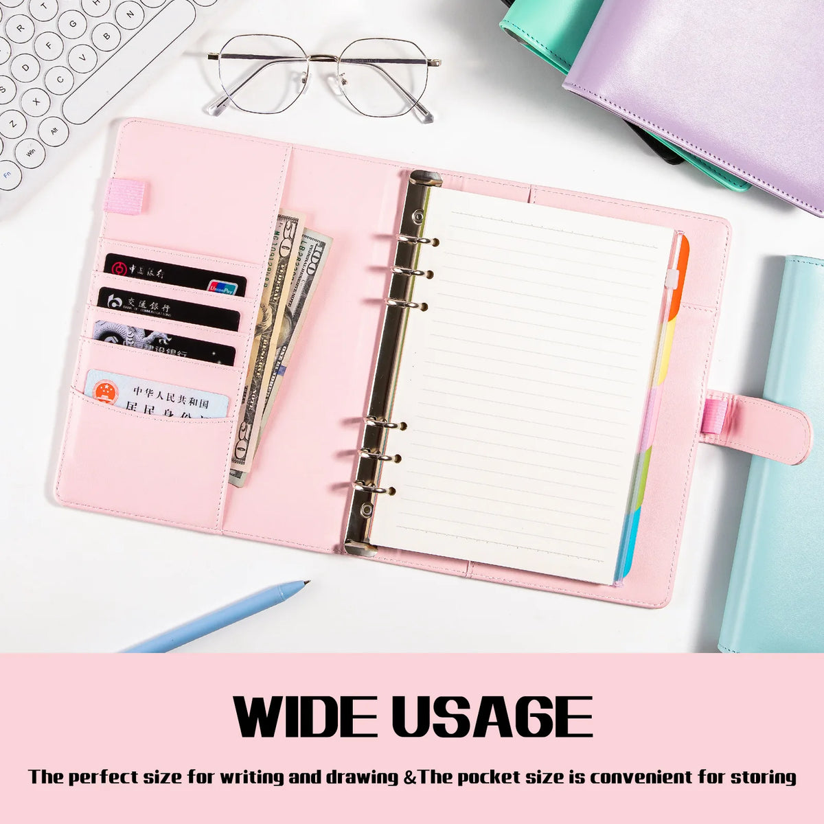A pink A5 PU leather binder notebook with lined paper and pen refills shown open on a white background.
