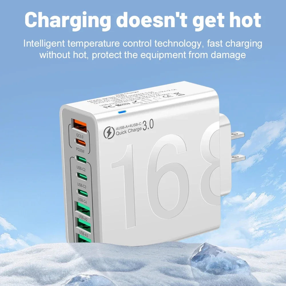A white universal multi-port fast charging wall adapter is shown against a snowy outdoor background.
