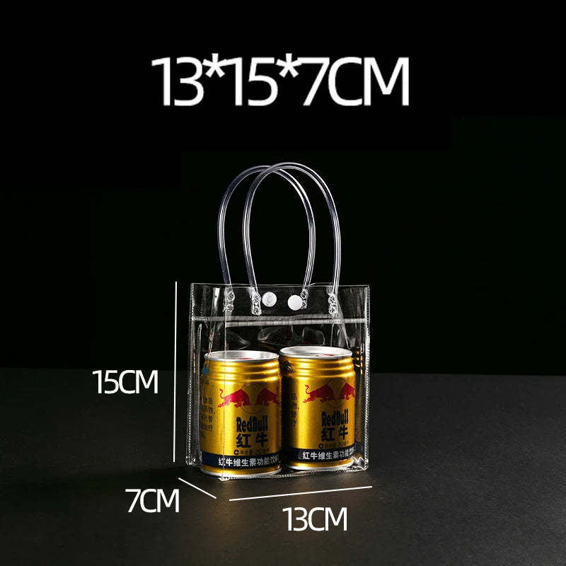 Bolsa de mano de PVC transparente con asa, regalo, que contiene dos latas cilíndricas de color dorado