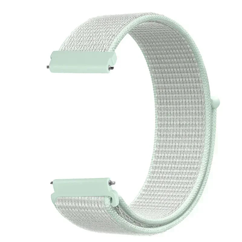 A light mint green nylon loop watch strap for a kid's watch, shown flat.