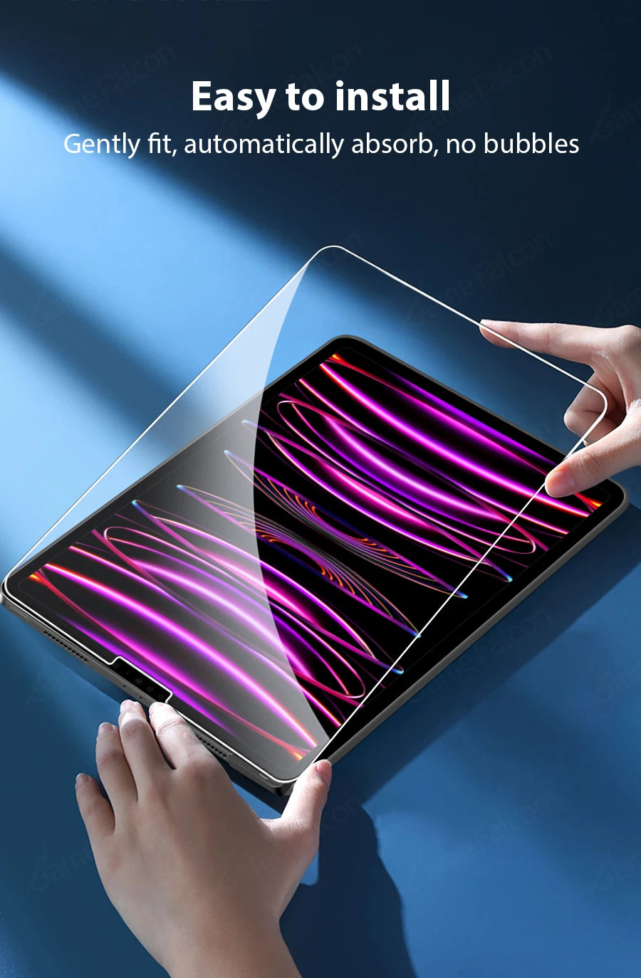 A hand is gently fitting a clear tempered glass screen protector onto an iPad screen.