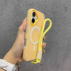 A hand holds a beige phone case with a white circle design and a yellow lanyard attached.