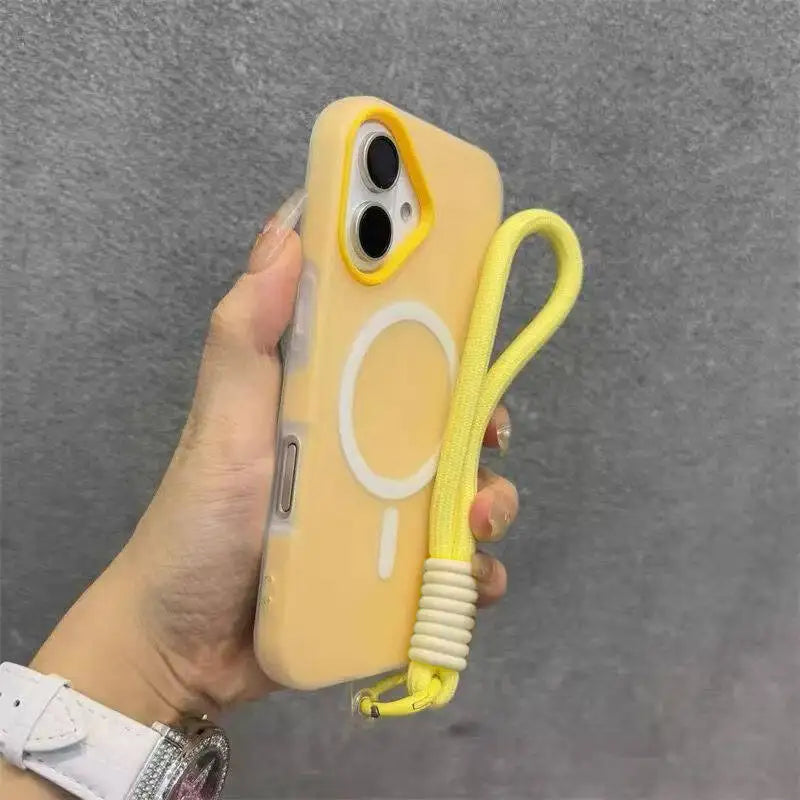 A hand holds a beige phone case with a white circle design and a yellow lanyard attached.